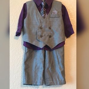 Grey suit with purple shirt and tie